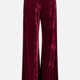 Back view of deep red velvet Pilar Wide Leg Velvet Trouser.
