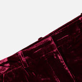 Deep red high-rise Pilar Wide Leg Velvet Trouser featuring a wide-leg silhouette and a waistband with belt loops.