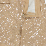 Close-up of Quincy Sequin High Rise Wide Leg Pant by L’AGENCE in distressed beige with visible zipper, button closure, and label. The high-rise, wide-leg pants are partially unzipped to show the white pocket lining.