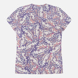 The L'AGENCE Ressi Short Sleeve Crewneck Butterfly T-Shirt, slim fit with an all-over purple, pink, and white butterfly and leaf print, is shown flat on a white background.