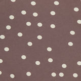 Close-up of the Ressi Short Sleeve Crewneck Polka Dot T-shirt by L'AGENCE, featuring a mauve color with white polka dots. The stretch jersey fabric label appears partially at the top left corner.