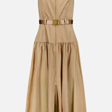 The Rima Belted Maxi Dress by L'AGENCE is a sleeveless light brown dress with a fitted bodice, front zipper, brown shoulder straps, gold-buckled waist belt, and a gathered knee-length skirt.