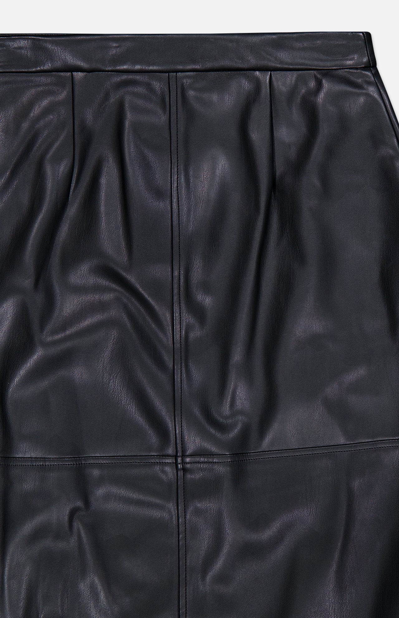 L’Agence Robyn Aline Midi Skirt in black vegan leather featuring a horizontal seam and high-waisted vertical pleats.