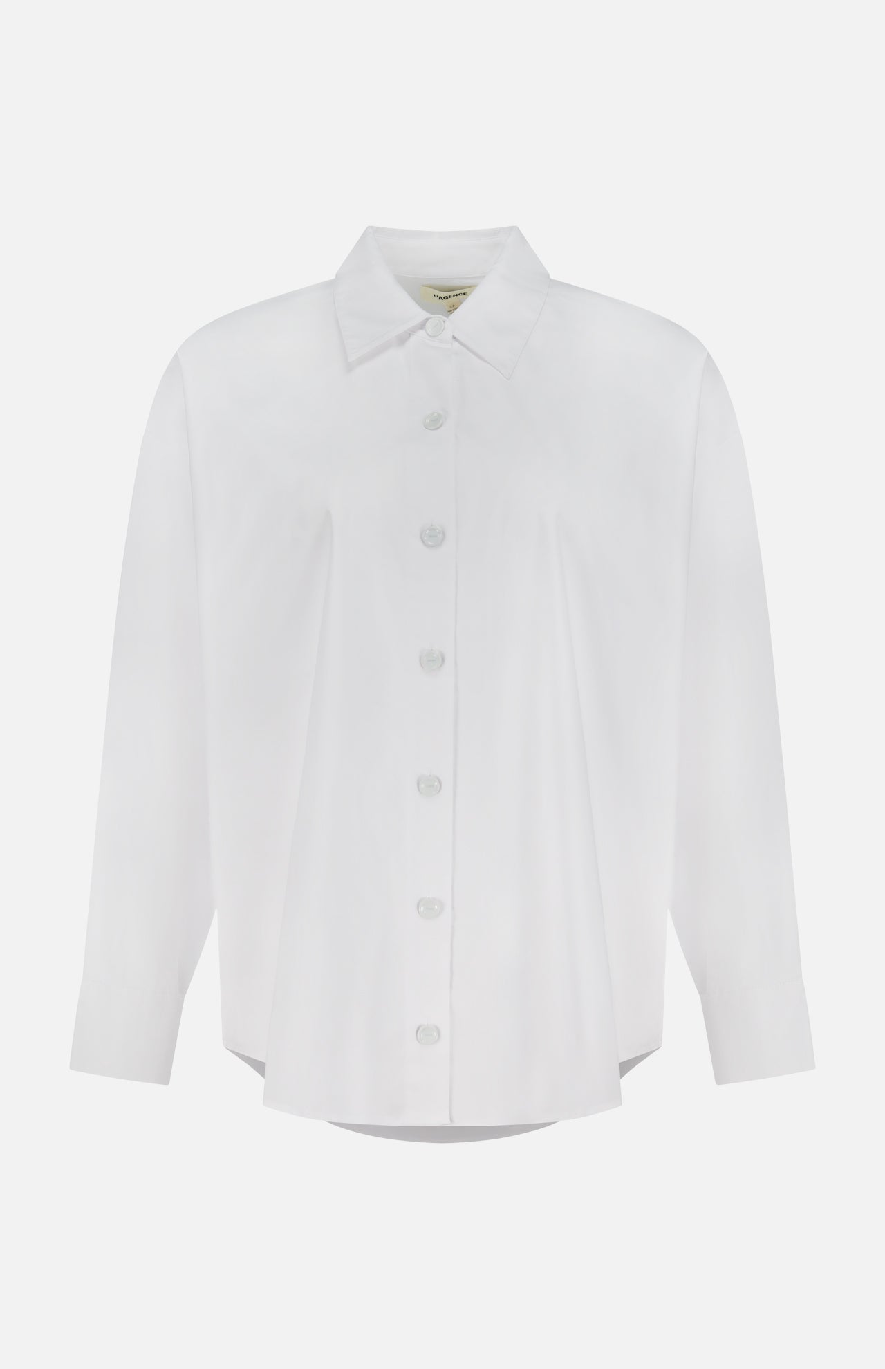 The Rylie Relaxed Dress Shirt by L'AGENCE is a plain white, long-sleeve organic cotton shirt with a collar, shown against a white background.
