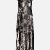 The Sayla Bias Cut Sequin Maxi Dress by L'AGENCE features a silver and black sequin design with spaghetti straps and a fitted, bustier-style bodice. Displayed against a plain white background, this event-ready evening dress channels vintage glamour while making a sparkling statement.
