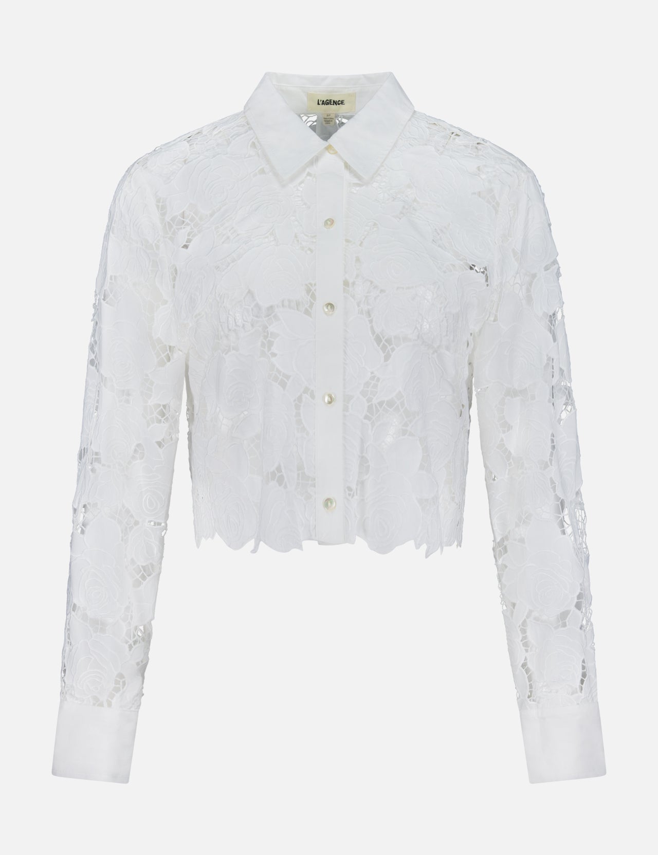The Seychelle Cropped Button Down Shirt by L'AGENCE features sheer, white floral lace, long sleeves, a classic collar, and a cropped hem for an elegant look.