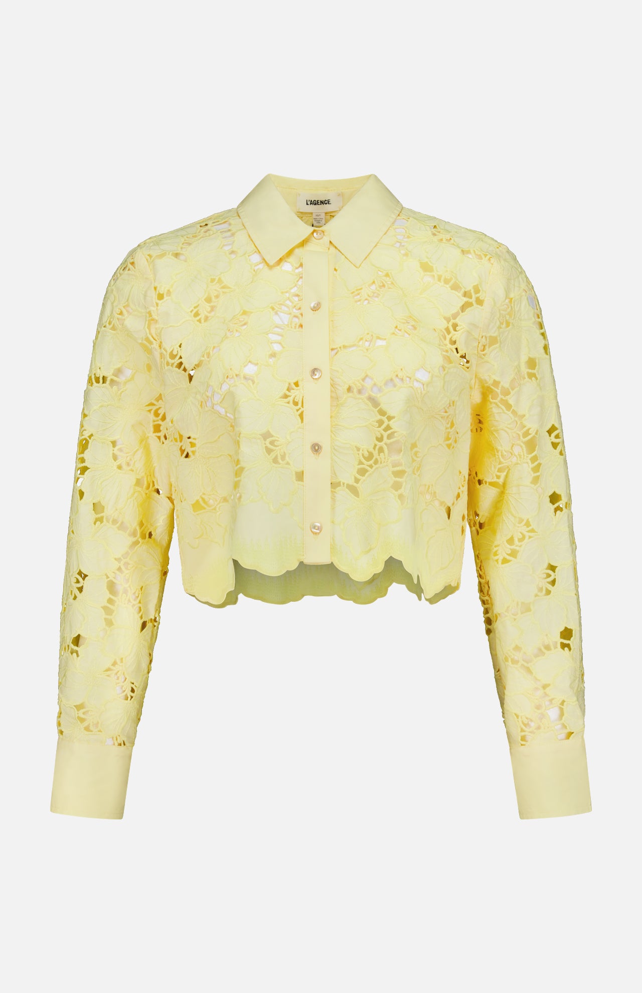 The Seychelle Cropped Button Down Shirt by L'AGENCE is a sheer yellow lace, long-sleeve, collared blouse with floral pattern—perfect as a light summer top.