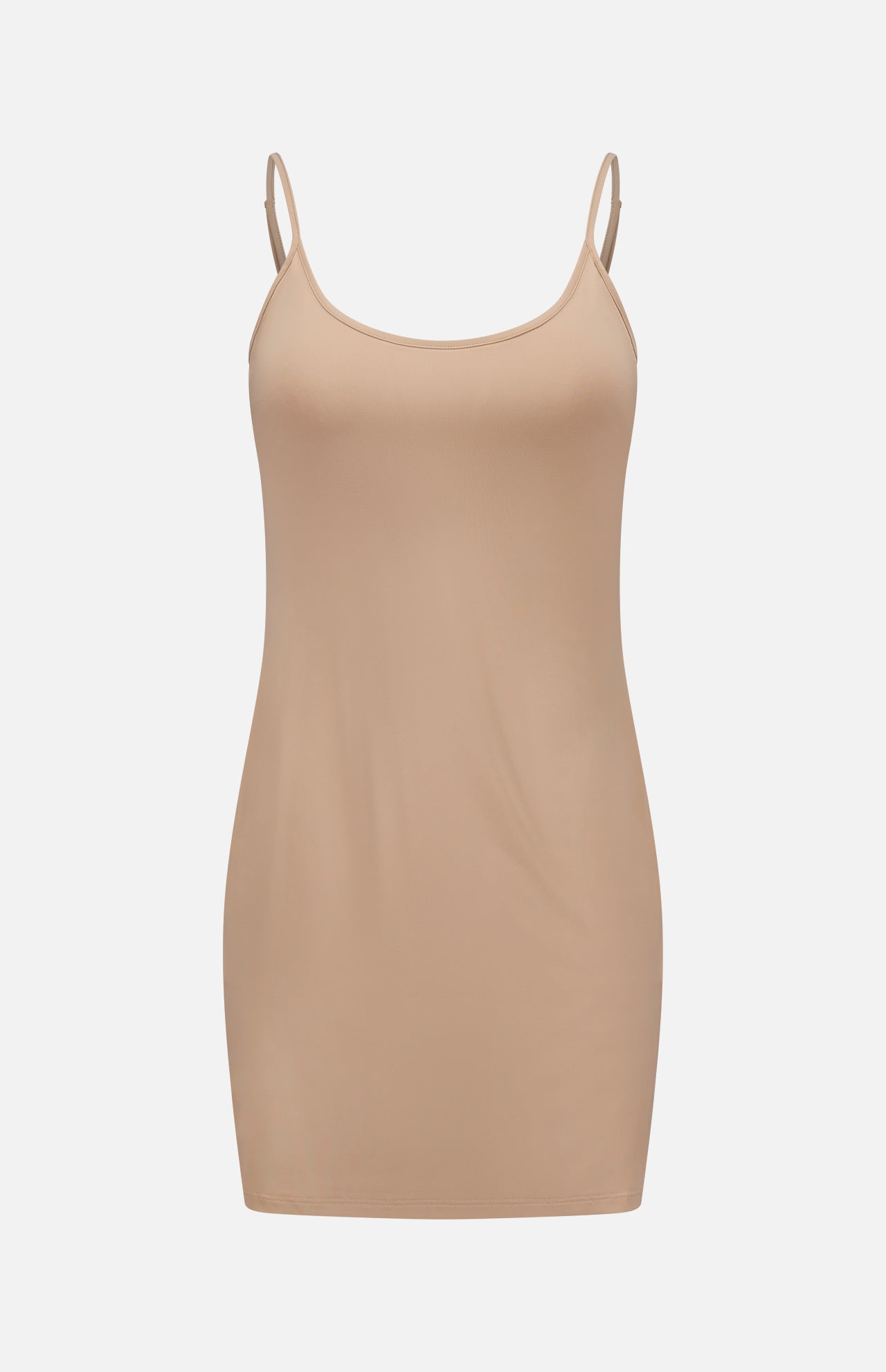 The L'AGENCE Slip Lining Mini Dress is a beige sleeveless bodycon stretch jersey dress with thin adjustable straps and a nude slip lining, shown on a plain white background.