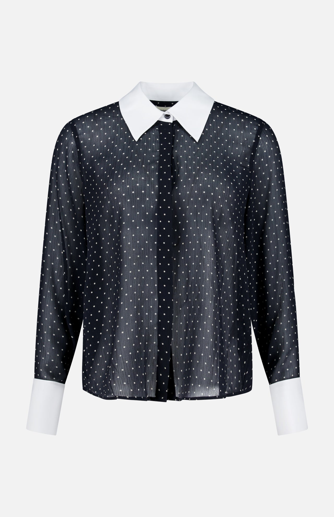 The Sona Poplin Collar Blouse by L’AGENCE is a black sheer long-sleeve blouse adorned with small white polka dots. It features a crisp white pointed collar and matching white cuffs, shown against a plain white background. This elegant blouse is perfect for the office, offering a polished and professional look.