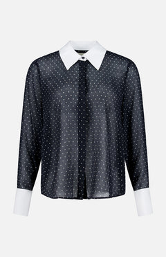 The Sona Poplin Collar Blouse by L’AGENCE is a black sheer long-sleeve blouse adorned with small white polka dots. It features a crisp white pointed collar and matching white cuffs, shown against a plain white background. This elegant blouse is perfect for the office, offering a polished and professional look.