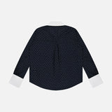The Sona Poplin Collar Blouse by L’AGENCE is a black blouse with long sleeves, adorned with small white polka dots throughout. It features crisp white cuffs and a classic white collar for a polished touch. Displayed from the back against a plain white background, this office-appropriate top blends timeless elegance with modern style.