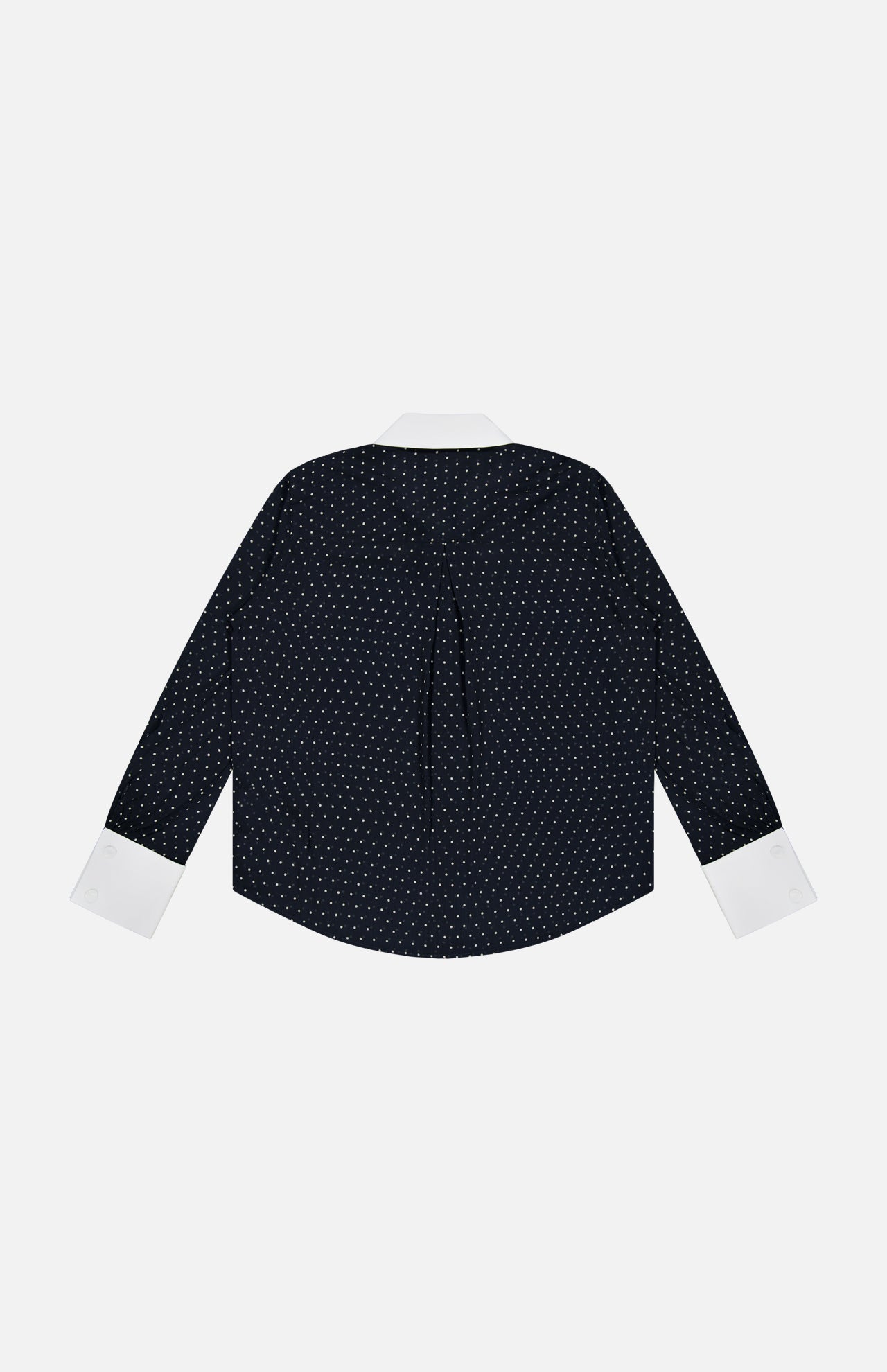 The Sona Poplin Collar Blouse by L’AGENCE is a black blouse with long sleeves, adorned with small white polka dots throughout. It features crisp white cuffs and a classic white collar for a polished touch. Displayed from the back against a plain white background, this office-appropriate top blends timeless elegance with modern style.