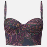 L’Agence Sonya Paisley Bralette Top in a strapless-style cropped bustier cut with thin adjustable straps, featuring a dark purple and pink paisley print.