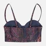 Back view of a dark purple paisley print L’Agence Sonya Paisley Bralette Top with thin adjustable straps and a smocked center back panel.