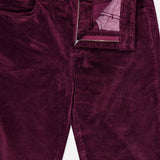 L’Agence Stevie High Rise Straight Pant in Deep Sangria: high-rise dark burgundy straight-leg corduroy pants with a zip fly and button closure.