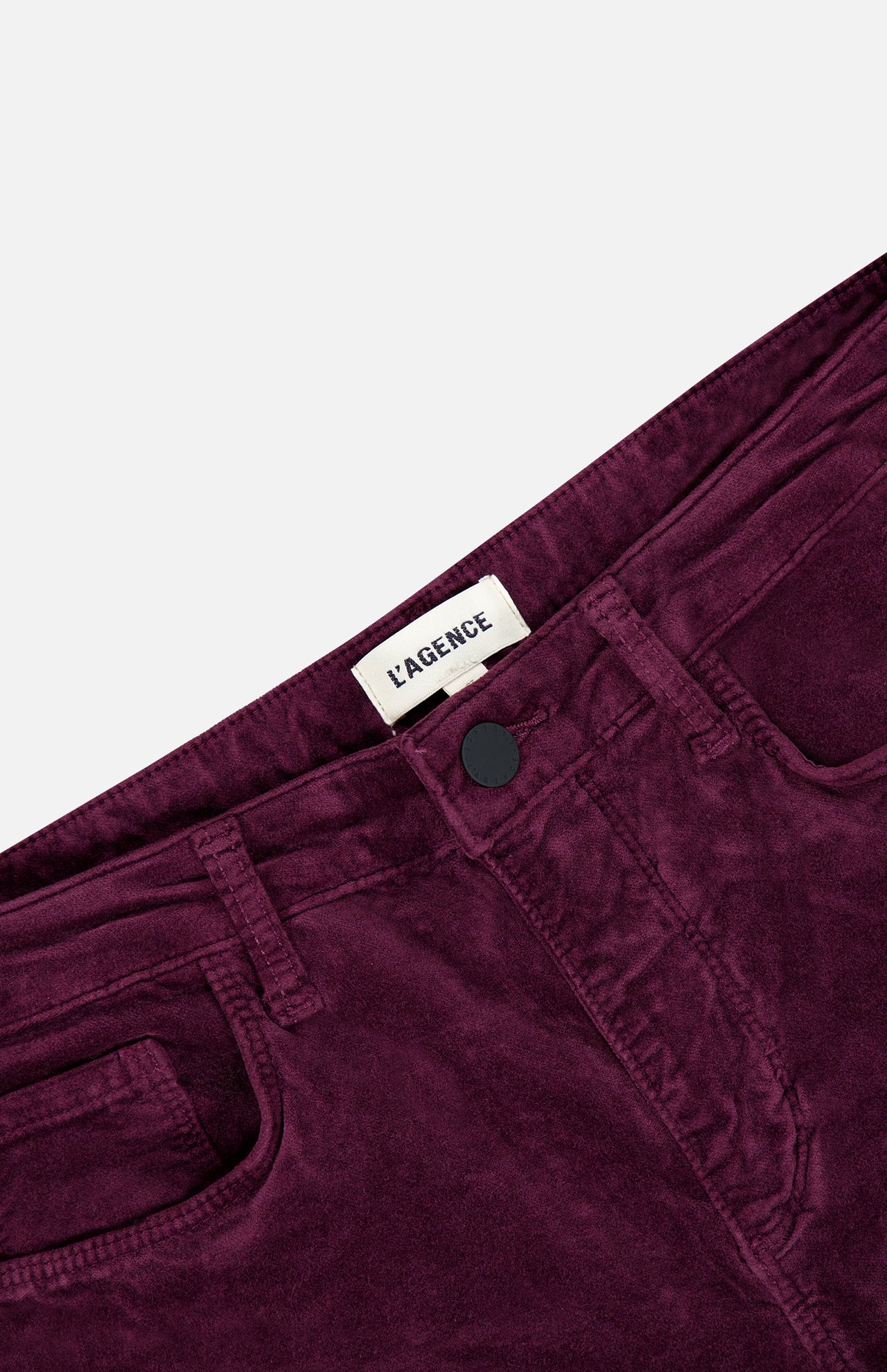 L’Agence Stevie High Rise Straight Pant in Deep Sangria: high-rise, deep berry-colored stretch velvet pants in a straight leg fit, featuring a button closure and front pockets.