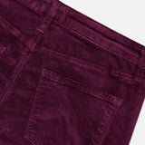 Close-up of the back of the L’Agence Stevie High Rise Straight Pant in Deep Sangria, showing the waistband, belt loops, and a pocket of the dark purple corduroy.