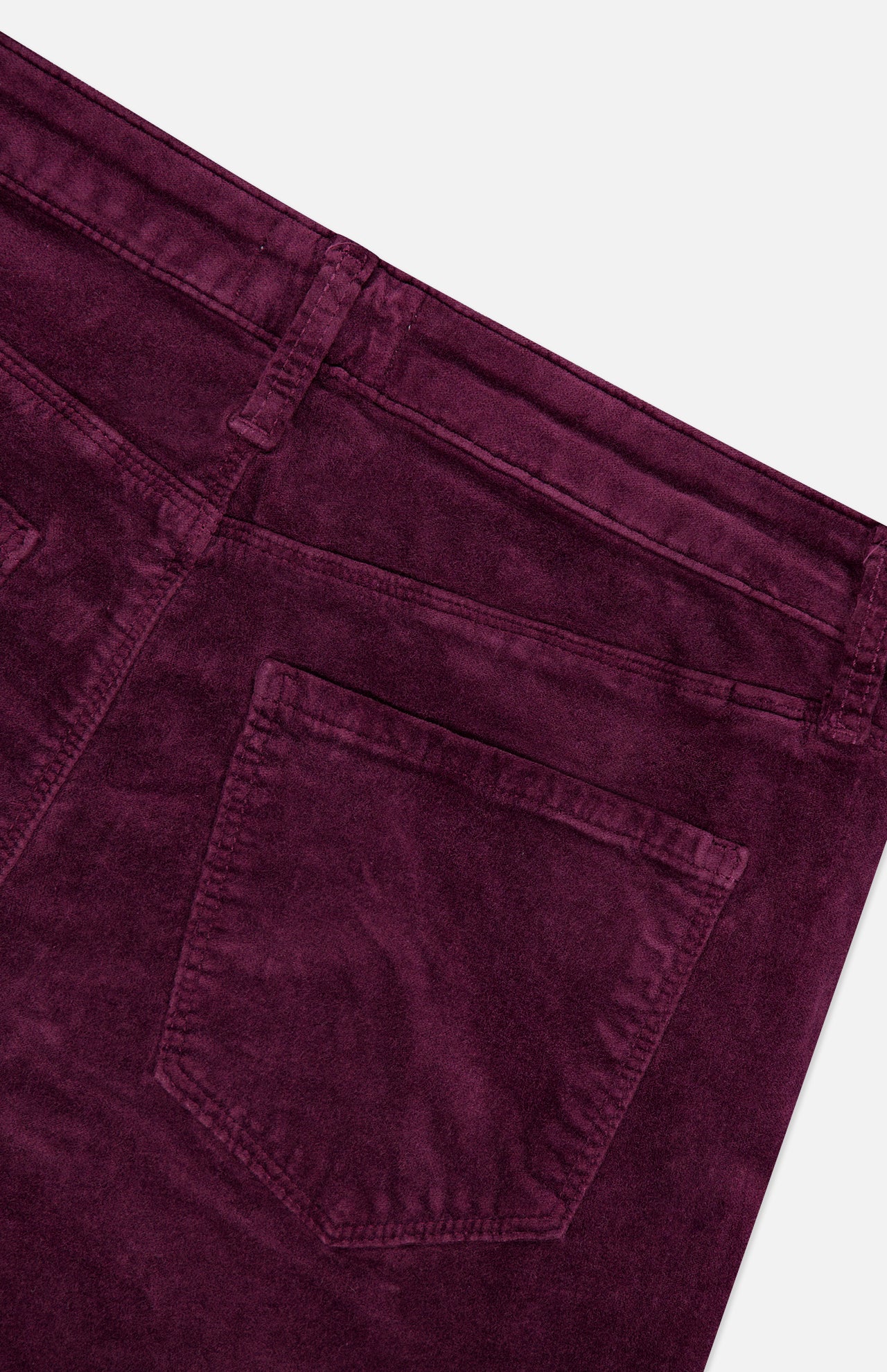 Close-up of the back of the L’Agence Stevie High Rise Straight Pant in Deep Sangria, showing the waistband, belt loops, and a pocket of the dark purple corduroy.