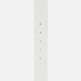 A close-up of the Tobar Lizard Embossed Leather Belt by L’AGENCE, featuring white lizard-embossed leather and five adjustment holes, displayed vertically against a plain white background.