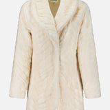 Cream-colored Toira Faux Fur Coat featuring a vintage-inspired design with a wide lapel.