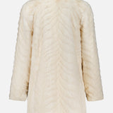 Back view of the L’Agence Toira Faux Fur Coat in champagne, featuring a subtle chevron pattern, a collar, and a vintage-inspired style.