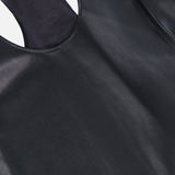 Close-up of the Tullia Racerback Scoop Neck Tank Top by L’AGENCE in black vegan stretch leather, featuring a smooth texture, round neckline, and subtle sheen under the lighting—making it an ideal going-out top.