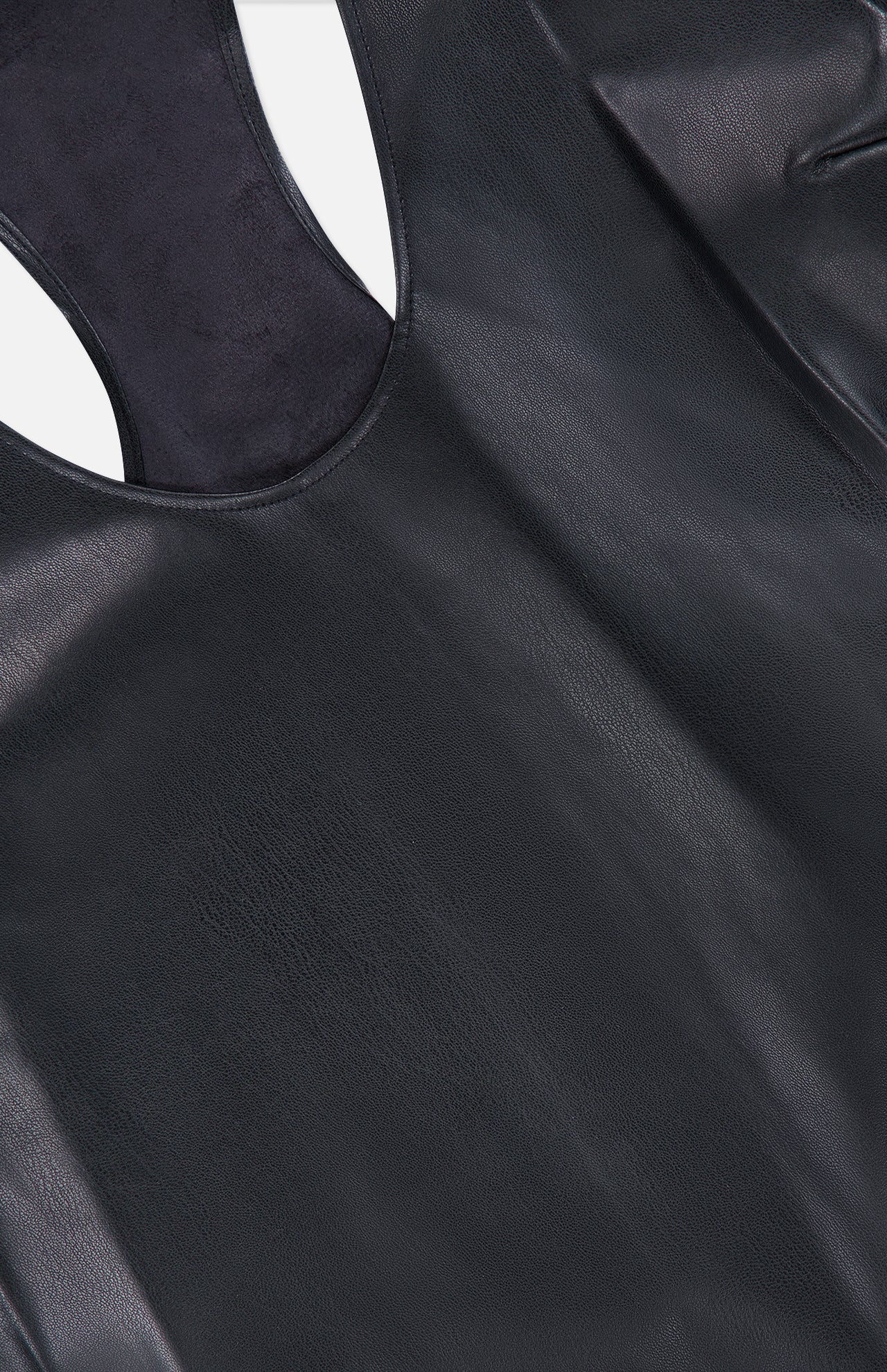 Close-up of the Tullia Racerback Scoop Neck Tank Top by L’AGENCE in black vegan stretch leather, featuring a smooth texture, round neckline, and subtle sheen under the lighting—making it an ideal going-out top.