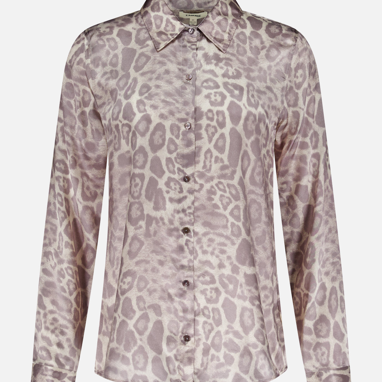 The Tyler Long Sleeve Silk Leopard Print Blouse by L'AGENCE features a classic collar, button-up front, and silky fabric in light mauve and beige tones, shown against a plain white background.