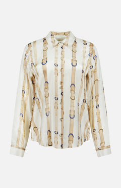 The Tyler Long Sleeve Belt Print Blouse by L’AGENCE is a women’s satin button-up adorned with a sophisticated beige and gold belt and buckle pattern over an elegant ecru background. Perfect for any occasion, this blouse effortlessly adds refined style to your wardrobe.