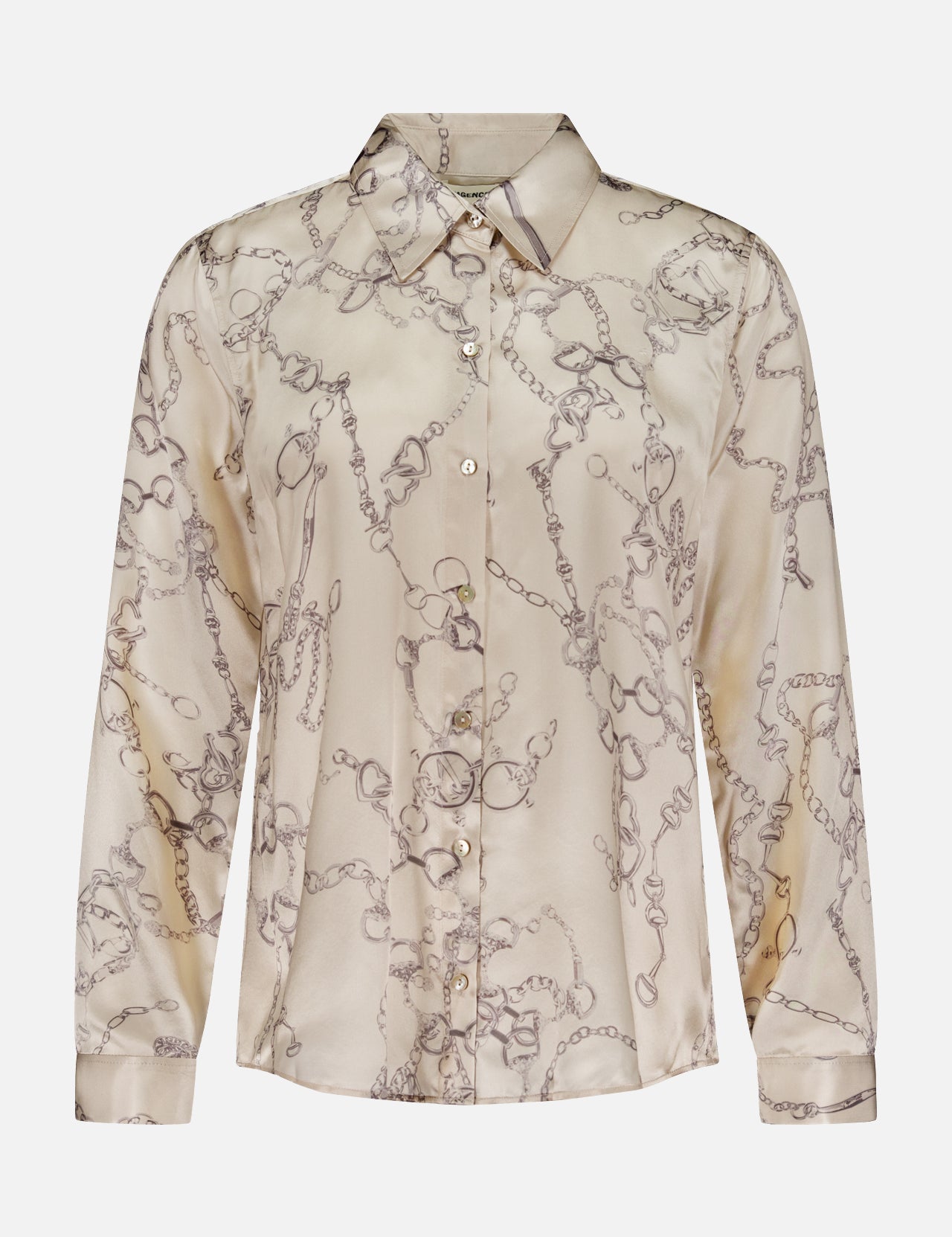 The Tyler Long Sleeve Chain Print Blouse by L'AGENCE is a light beige, button-up blouse featuring a subtle chain print and pointed collar, offering a refined, tailored silhouette.