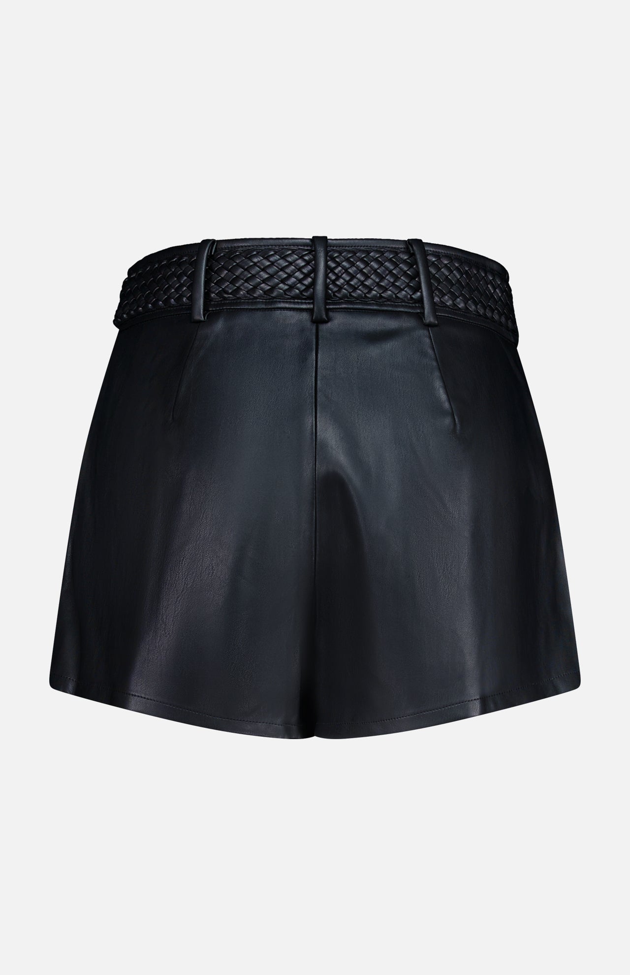 The Virelle Braided Waistband Short by L’AGENCE features black vegan leather with a high waist, front pleats, side pockets, and a braided waistband threaded through belt loops, displayed against a plain white background.