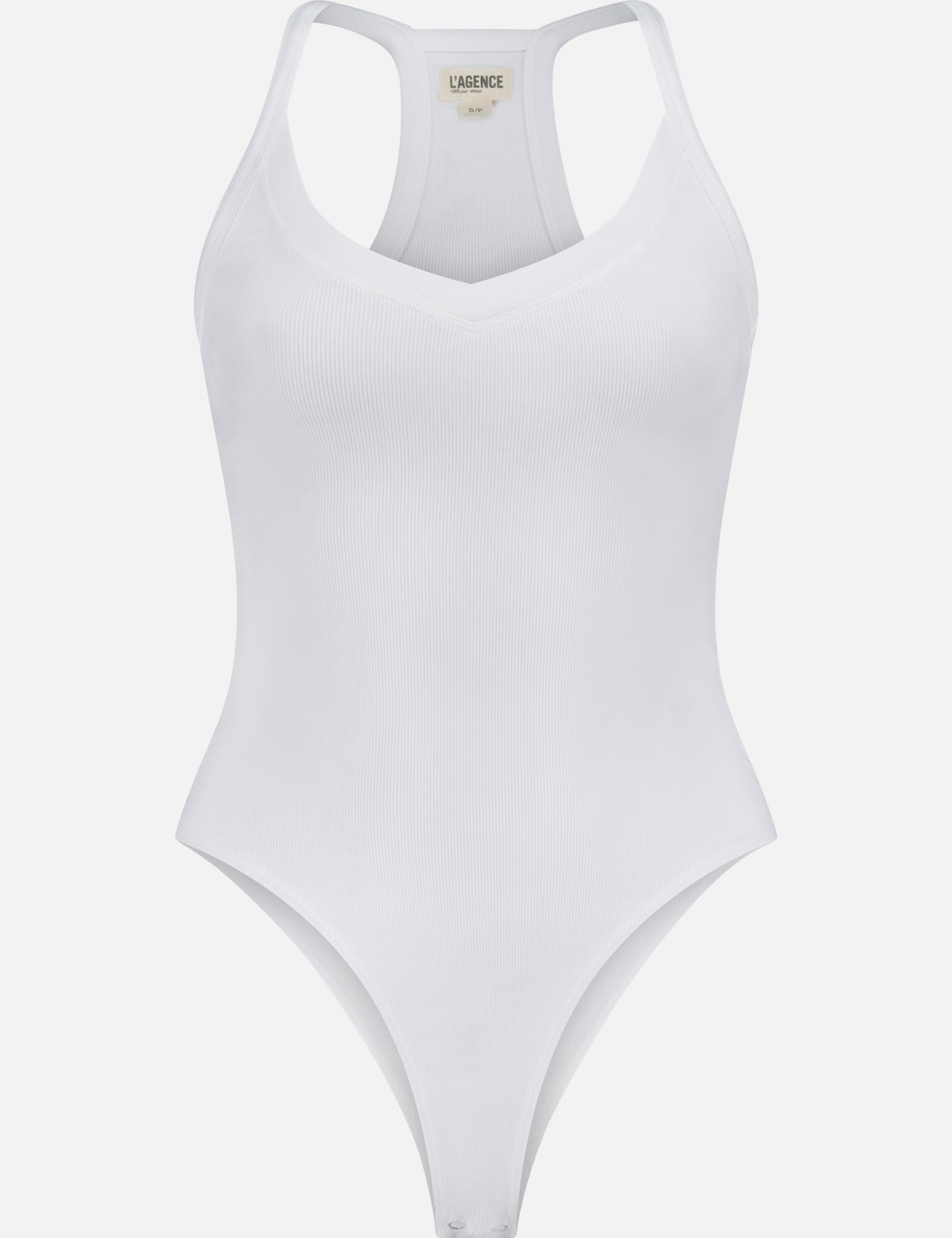 The Wrenna Racerback Bodysuit by L'AGENCE is a white fitted ribbed bodysuit with a V-neckline and racerback design, shown against a plain white background.