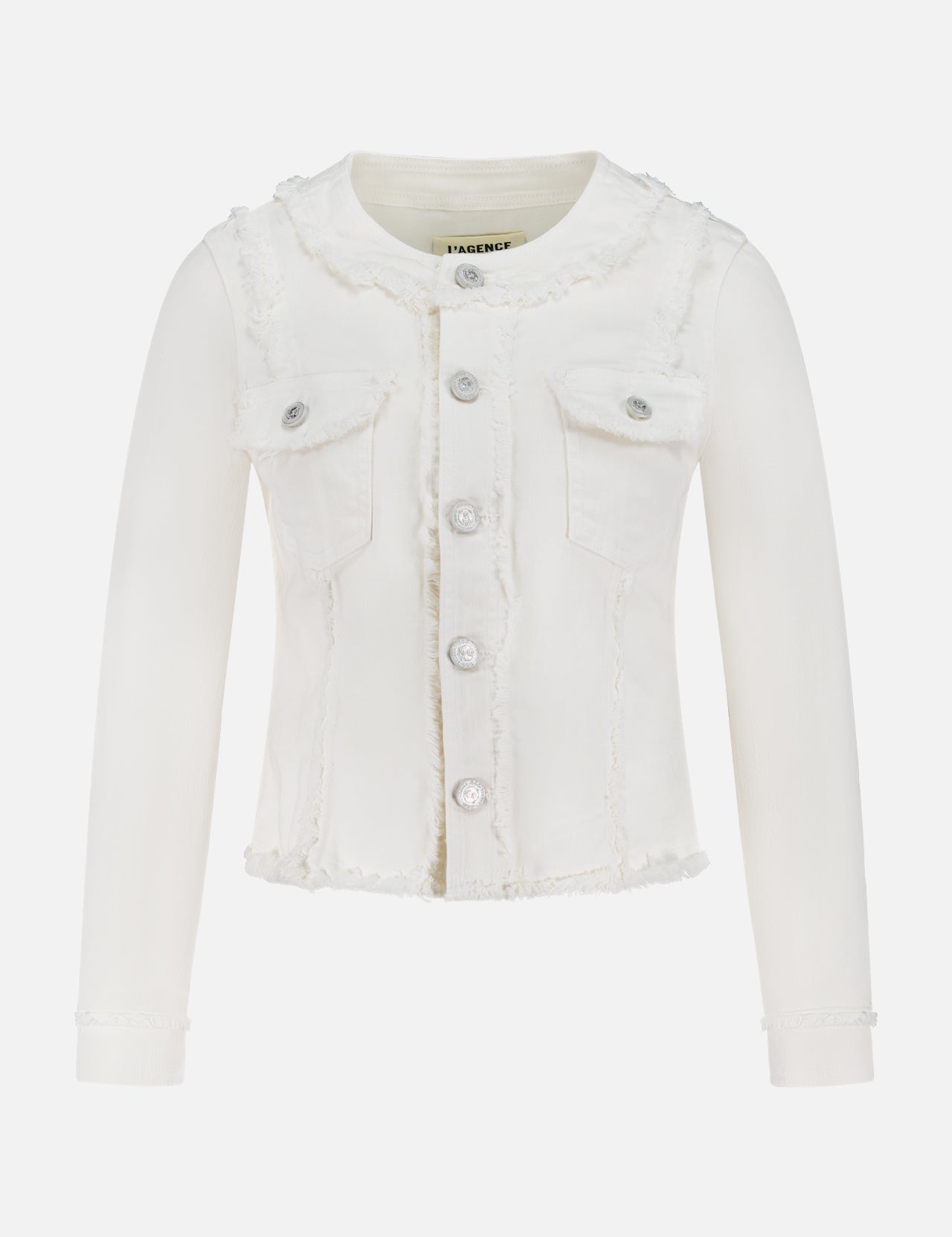 The L'AGENCE Yarin Collarless Fray Jacket—a white women’s jean jacket with silver buttons, chest pockets, and frayed seams, cuffs, and collar—is shown on a plain white background.