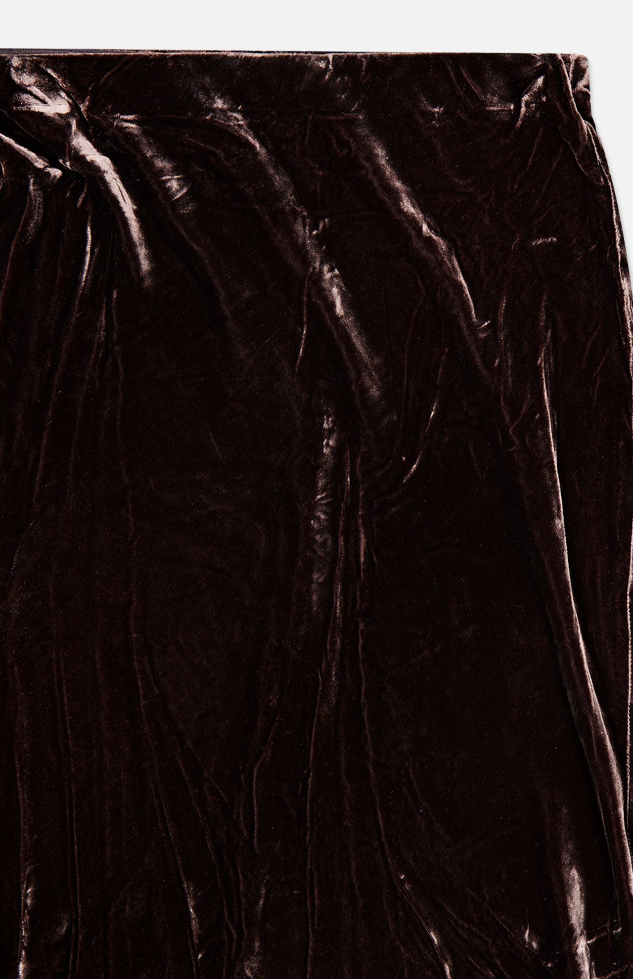 Close-up of a dark brown velvet Zeta Long Velvet Skirt in a bias-cut maxi silhouette.