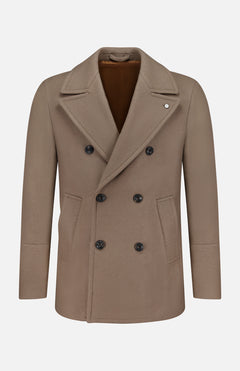 The L.B.M. Double Breasted Car Coat is a taupe wool-blend coat made in Italy, showcased on a plain white background. It features black buttons, wide lapels, flap pockets, and a smooth brown lining.