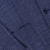 Close-up of the Glen Plaid 2 Button Sportcoat by L.B.M., featuring a blue plaid patterned fabric with two dark buttons visible.