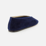 The Luna Suede Slipper Flat by LE MONDE BERYL is shown from the back in dark blue suede, featuring a rounded toe and low heel. Made in Italy, it stands against a plain light background.