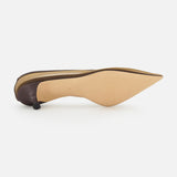 The LE MONDE BERYL Babouche Mesh Kitten Heel is displayed on its side, tan sole facing up, showing its pointed toe, dark mesh upper, and slim curved kitten heel.