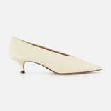 The Babouche Leather Kitten Heel by LE MONDE BERYL is shown in side view, featuring an off-white leather pointed toe and slender low profile, set against a plain white background.