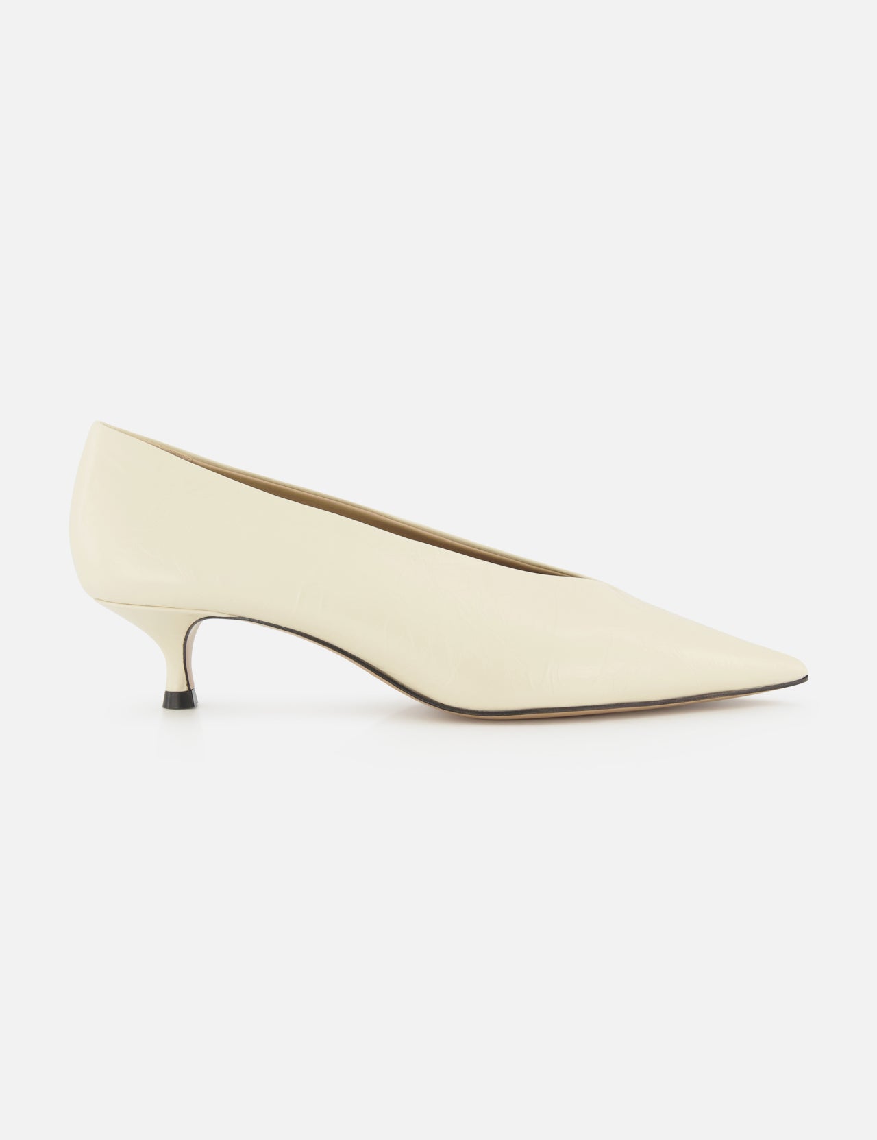 The Babouche Leather Kitten Heel by LE MONDE BERYL is shown in side view, featuring an off-white leather pointed toe and slender low profile, set against a plain white background.