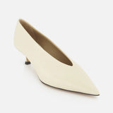 The Babouche Leather Kitten Heel by LE MONDE BERYL is a single off-white pointed toe pump with a low kitten heel, shown on a white background.