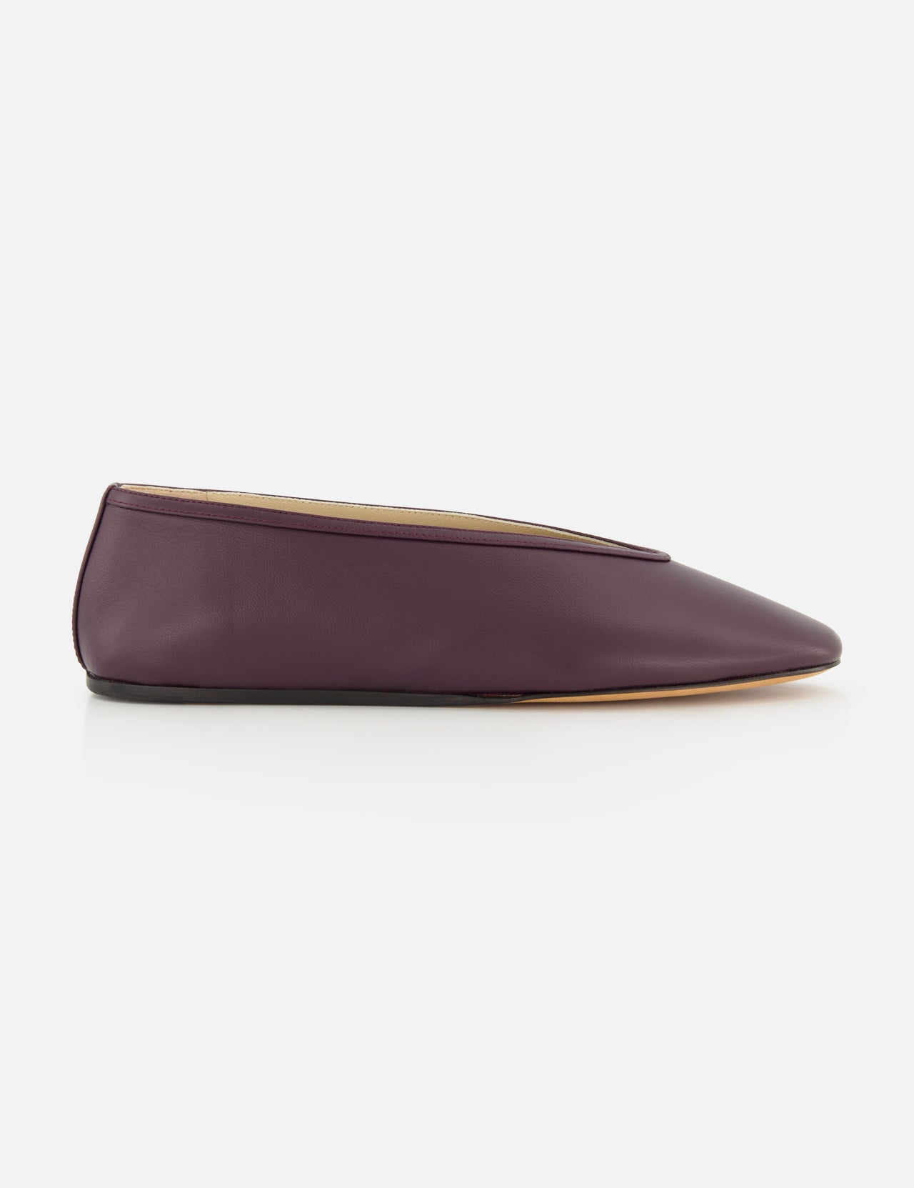 Handcrafted in Italy, the deep purple Luna Leather Slipper Flat by Le Monde Béryl features a low-cut topline and a flat sole.