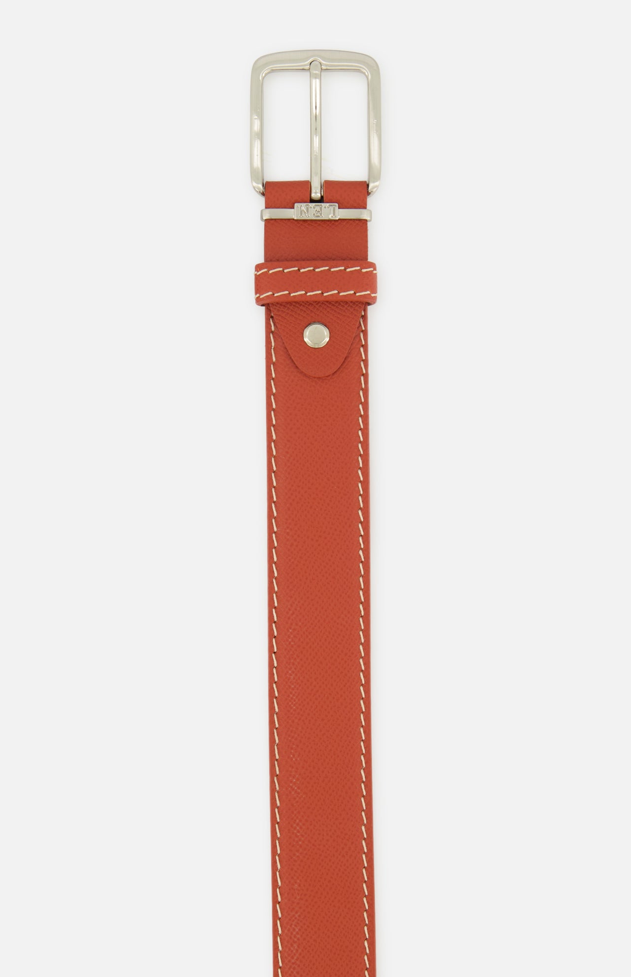 LEN Belts Epsom belt in burnt orange European leather with a silver buckle and white contrast stitching.