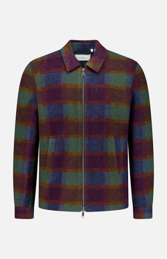 Introducing the LES DEUX Check Wool Zipper Coach Jacket—a zip-up coach jacket crafted from a wool blend, designed with a collared neck and long sleeves. This statement piece showcases a bold check pattern in shades of purple, green, and blue against a light background, making it the perfect addition to your preppy urban wardrobe for an autumnal touch.