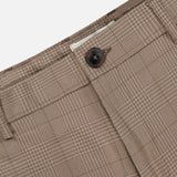 Close-up of LES DEUX Como Reg Houndstooth Suit Pants showing straight fit, button closure, zipper fly, belt loops, and subtle houndstooth pattern with visible fabric texture and stitching details.