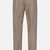 Back view of LES DEUX Como Reg Houndstooth Suit Pants featuring a straight fit, houndstooth pattern, belt loops, and two back welt pockets, shown on a plain white background.