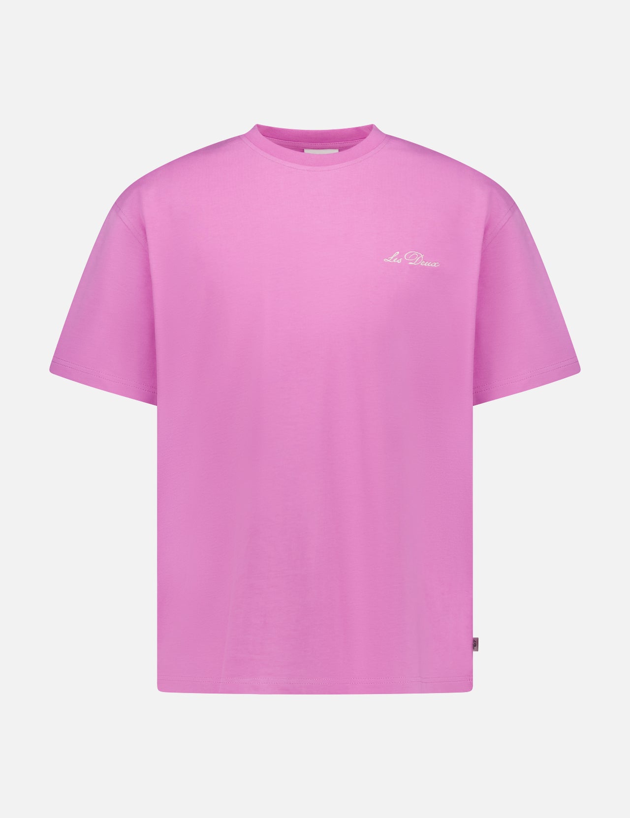The LES DEUX Crew Neck Logo T-shirt is a bright pink, short-sleeved tee featuring a small white script logo on the left chest, ideal for casual wear and shown against a white background.
