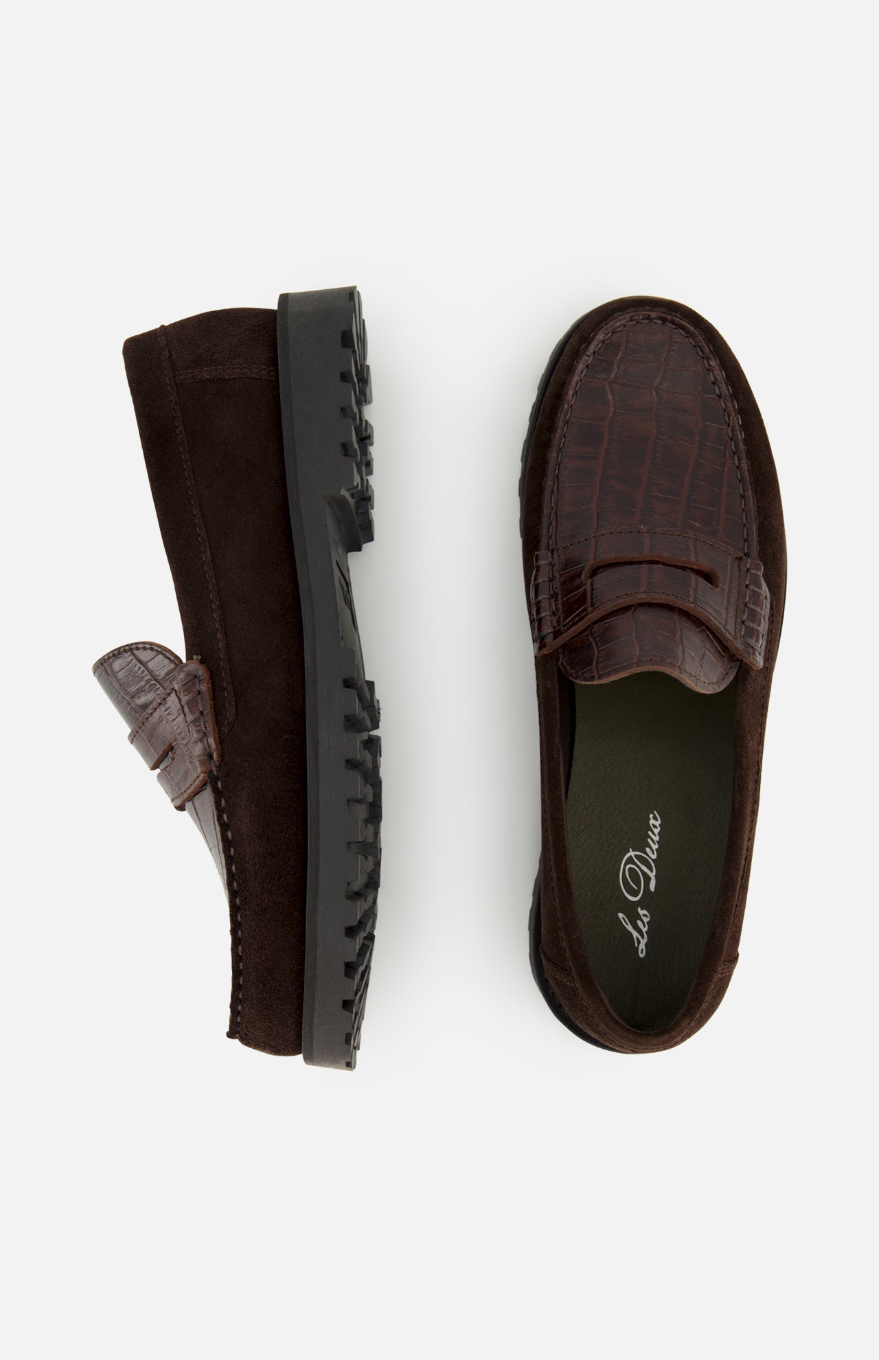 Presenting the LES DEUX Croco Mix Loafer: a pair of dark brown penny loafers made from a blend of textured leather and suede, highlighted with distinctive crocodile-embossed leather accents. The loafers are displayed in both side and top views on a white background.