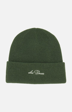 The LES DEUX Signature Logo Beanie is a ribbed, dark green knit wool beanie with a folded cuff and features the embroidered Les Deux logo in white on the front.