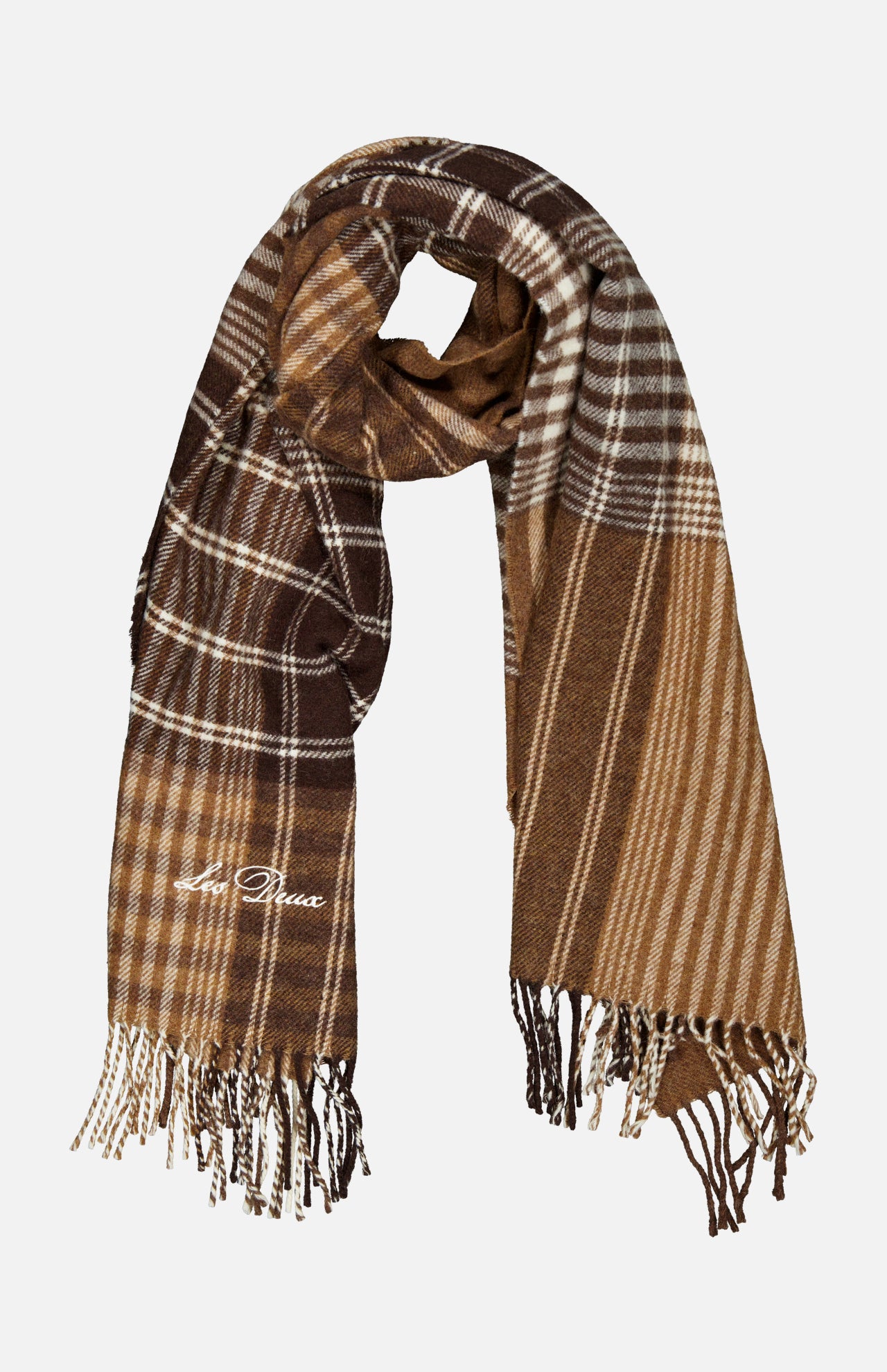 LES DEUX Signature Patchwork Check Scarf in brown and beige plaid, featuring fringe embellishment and a subtle embroidered signature on one side, displayed against a plain white background.